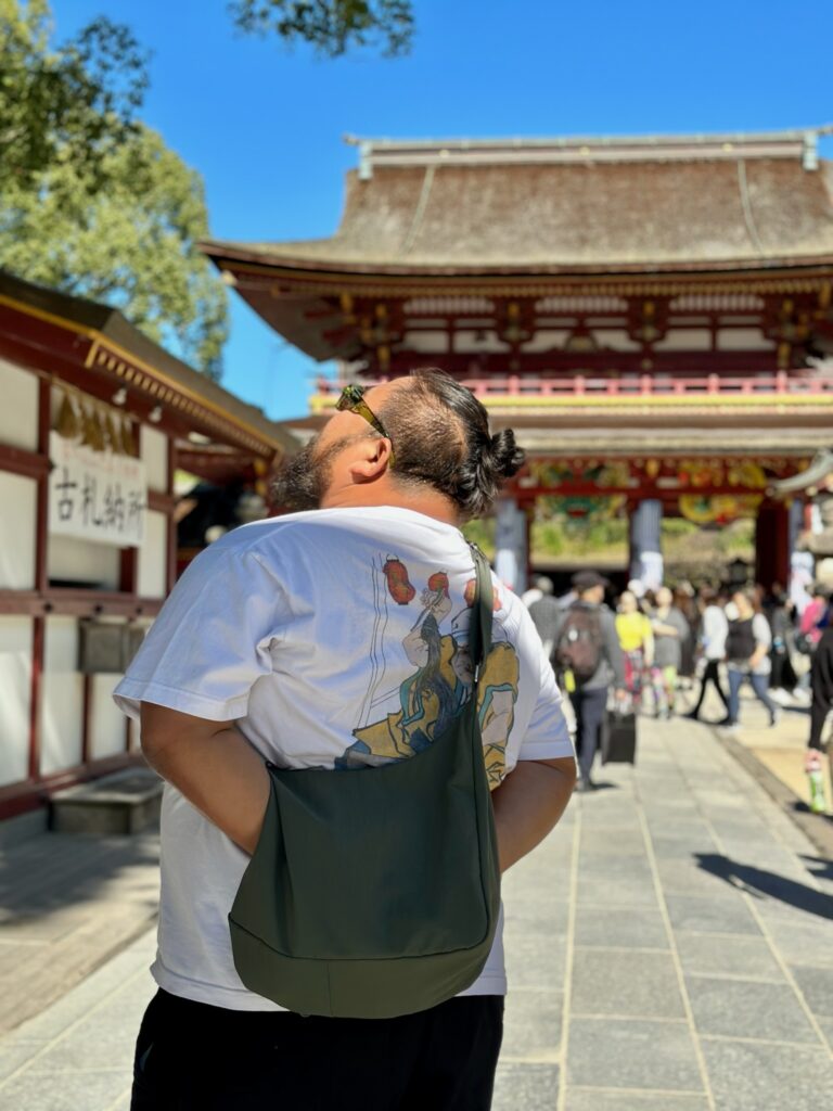 Man looking at a historic site in Fukuoka, Japan
